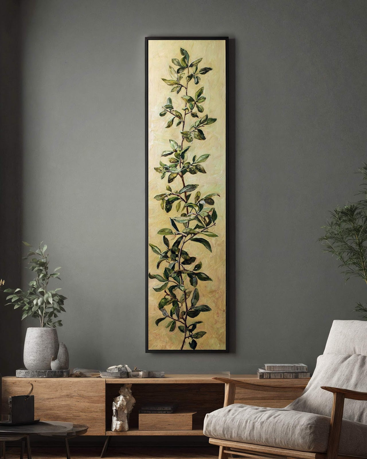 Vertical canvas wall art in interior setting.