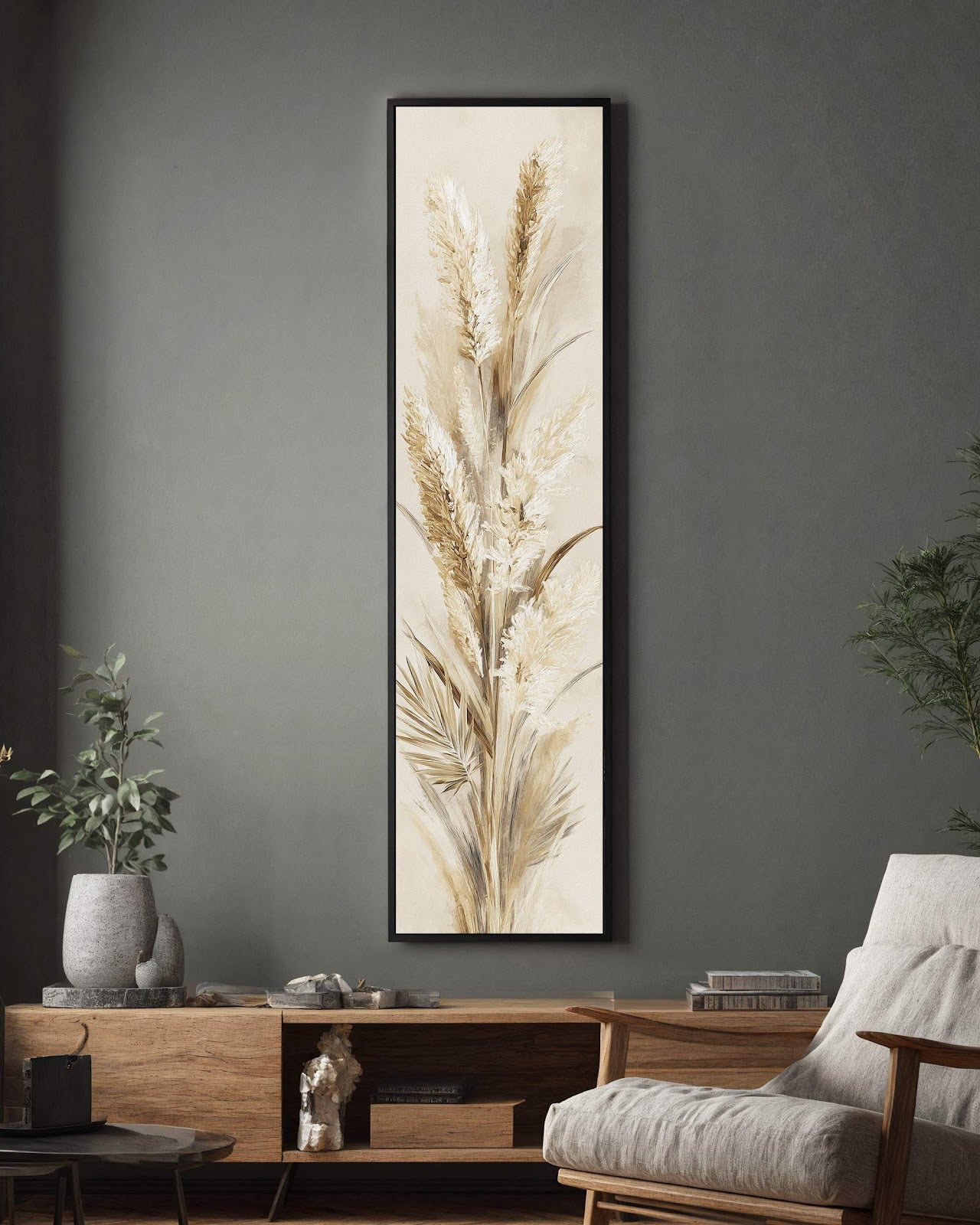This vertical canvas wall art depicts textured pampas grass in a neutral palette, showcased in a black floater frame on a grey wall above a rustic wood console.