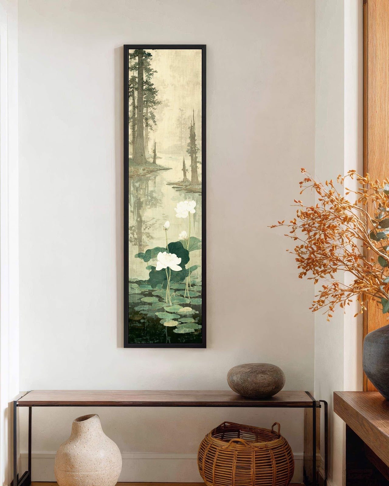 Vertical canvas wall art in interior setting.