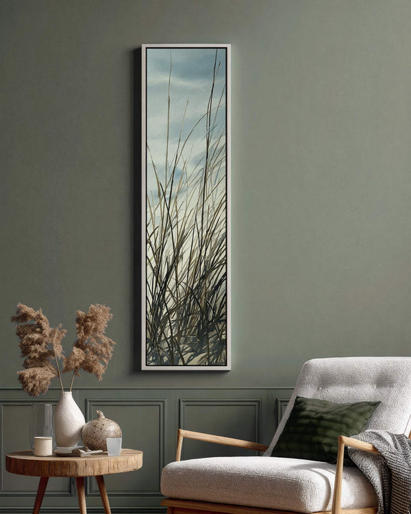 Vertical canvas wall art in interior setting.
