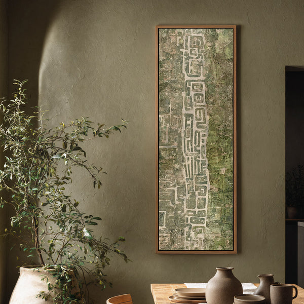 Vertical canvas wall art in interior setting.