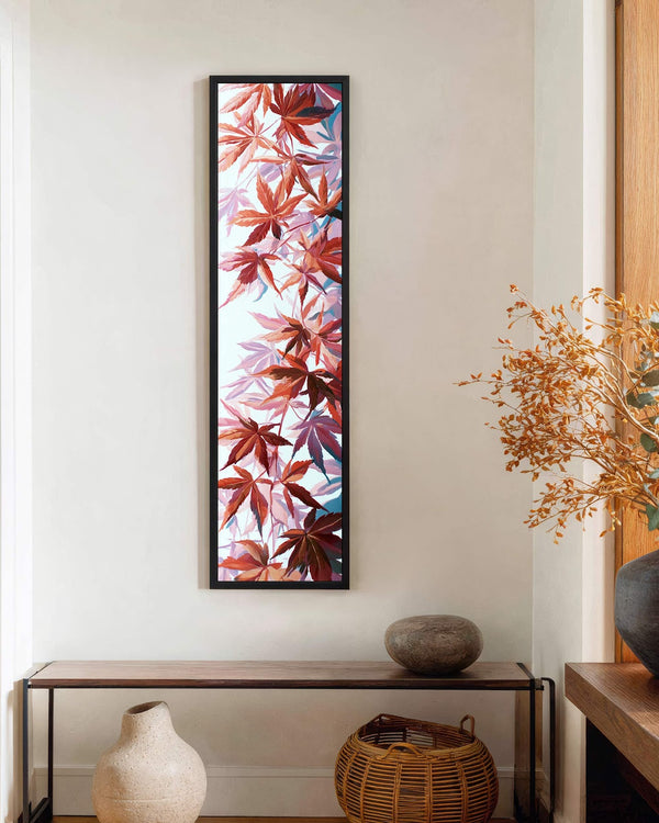 Vertical canvas wall art in interior setting.