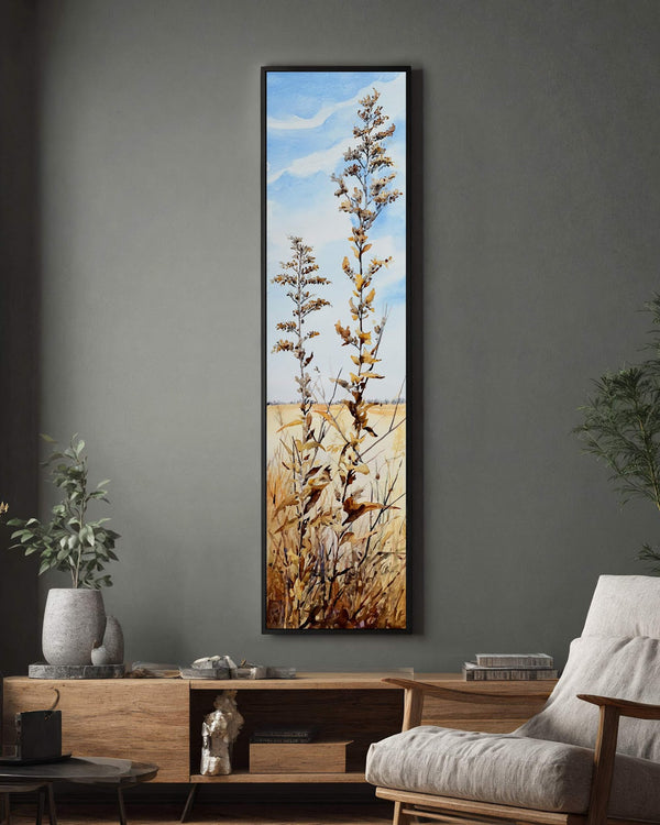 Vertical canvas wall art in interior setting.