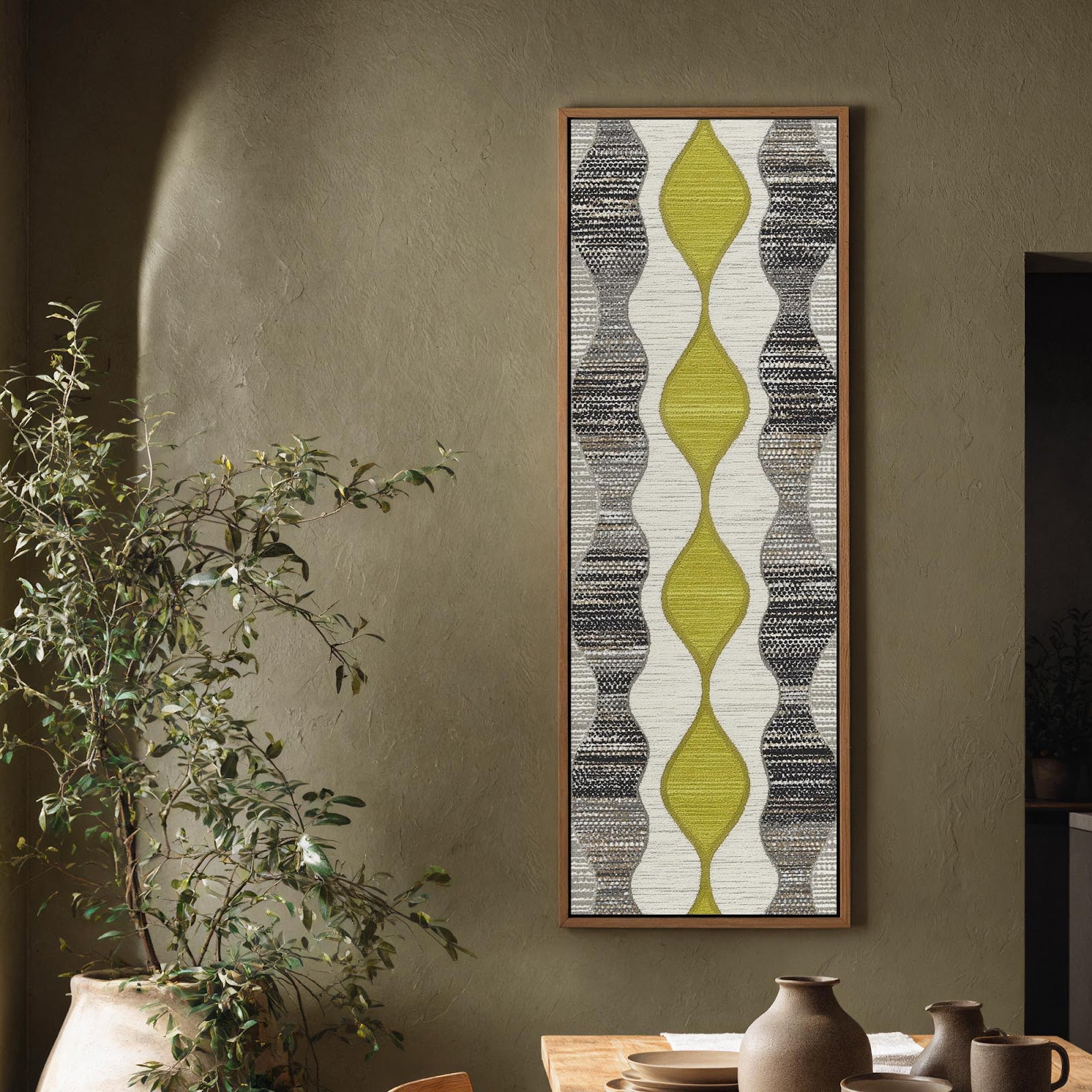 Vertical canvas wall art in interior setting.