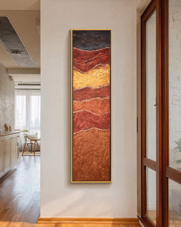 Vertical canvas wall art in interior setting.