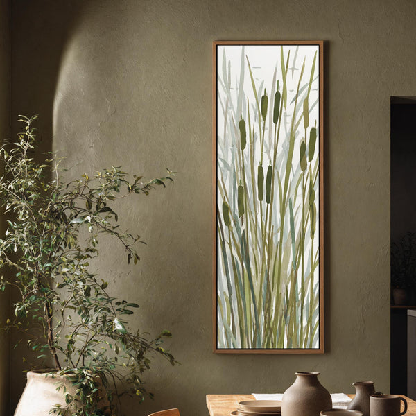 Vertical canvas wall art in interior setting.