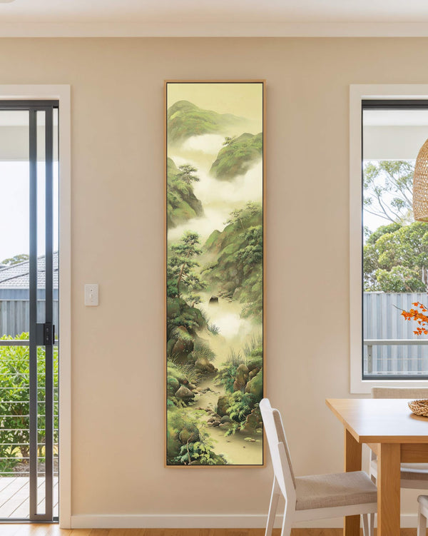 Vertical canvas wall art in interior setting.