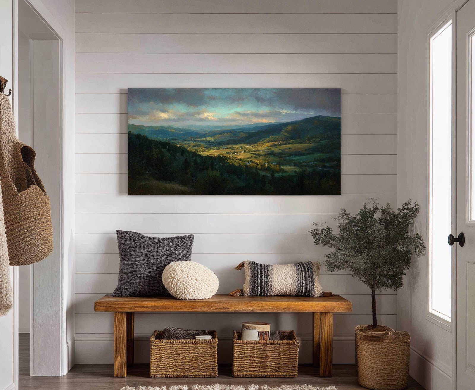 This horizontal canvas wall art depicts a serene valley with rolling hills under a dramatic, cloudy sky, rendered in a realistic style with a rich green and blue palette. It.