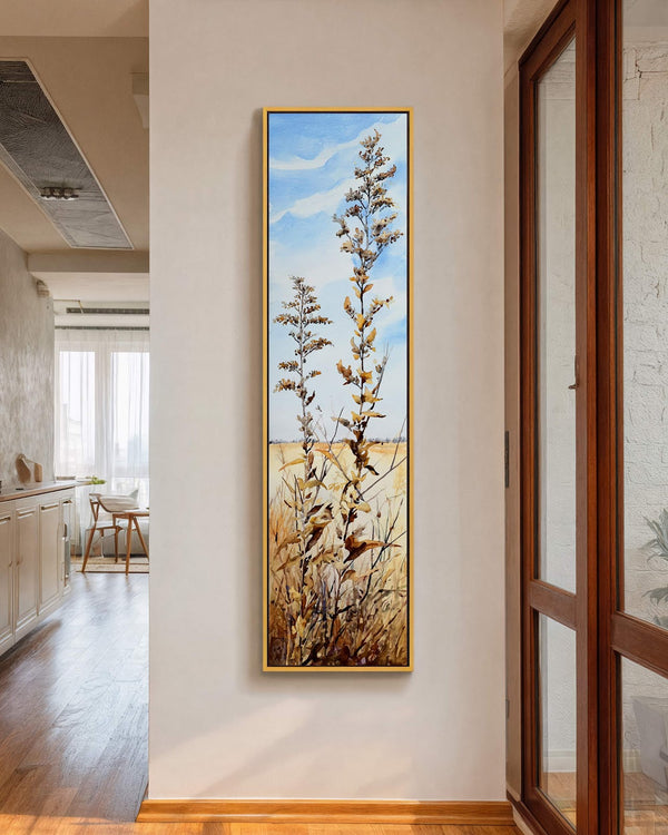 Vertical canvas wall art in interior setting.