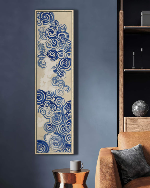 Vertical canvas wall art in interior setting.