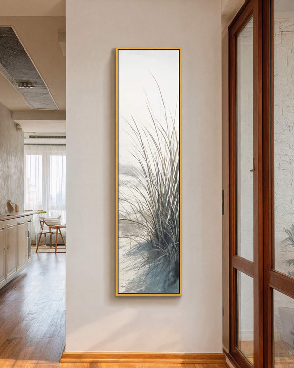 Vertical canvas wall art in interior setting.