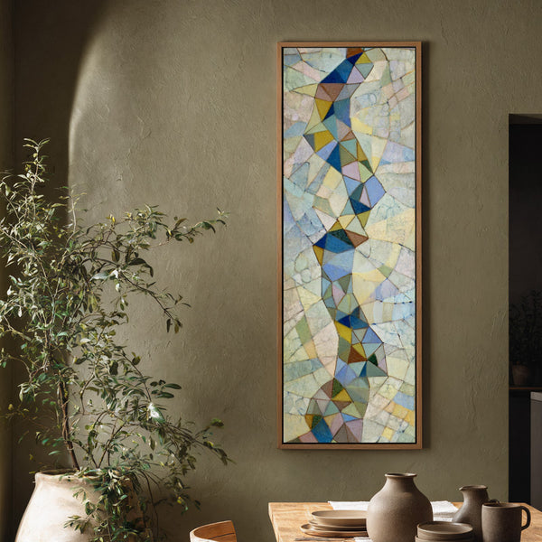 Vertical canvas wall art in interior setting.