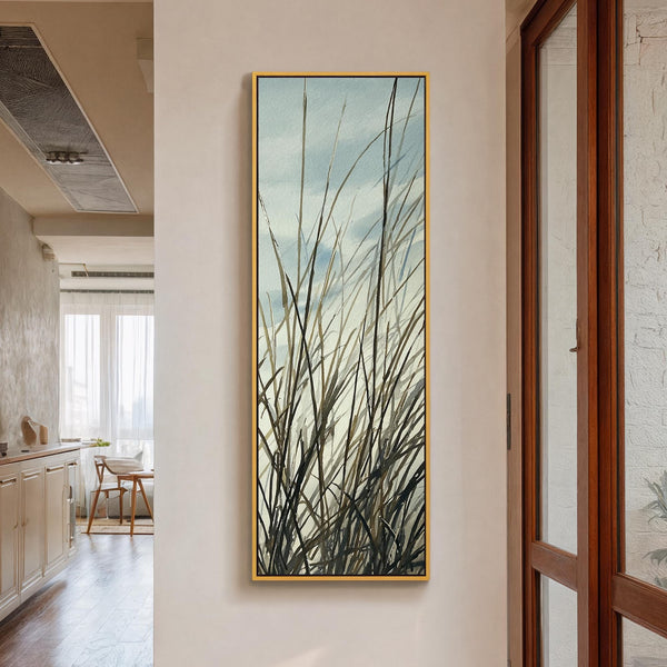 Vertical canvas wall art in interior setting.