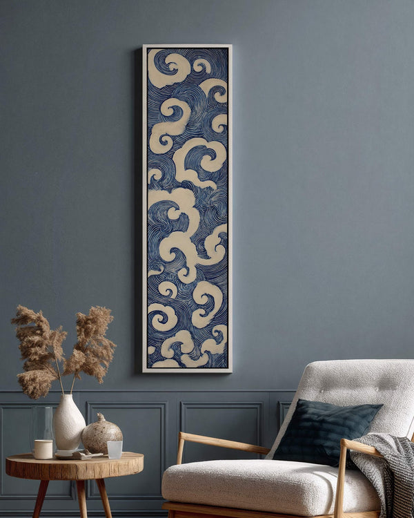 Vertical canvas wall art in interior setting.