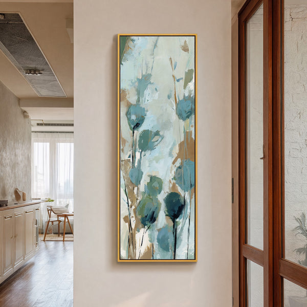 Vertical canvas wall art in interior setting.
