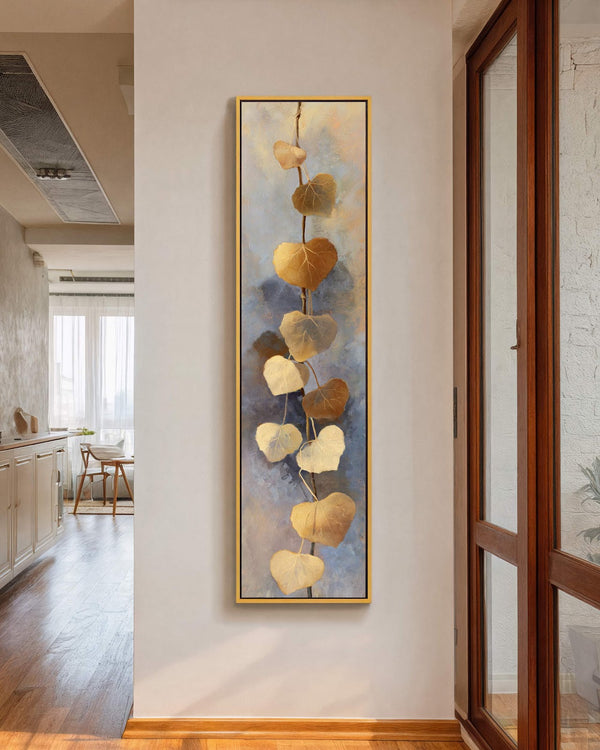Vertical canvas wall art in interior setting.