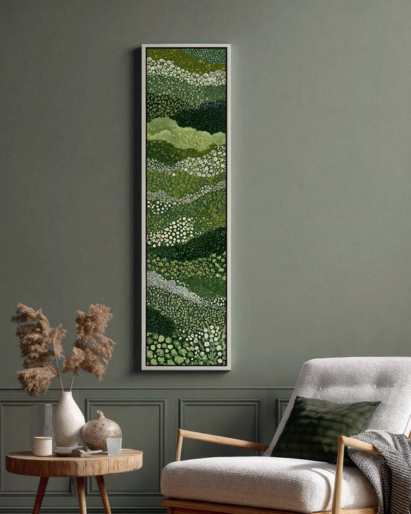 Vertical canvas wall art in interior setting.