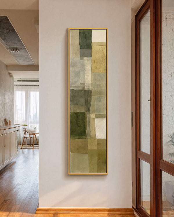 Vertical canvas wall art in interior setting.