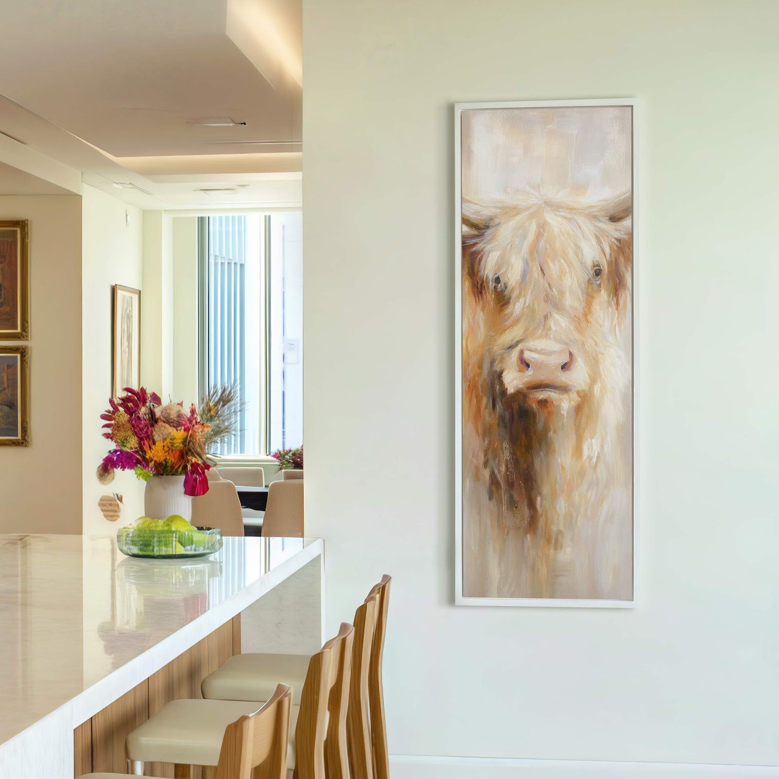 This vertical canvas print features a Highland cow with a soft, neutral palette and painterly style, displayed on a white wall with a bar and stools visible in the foreground.