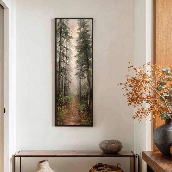 This vertical canvas wall art displays a misty forest scene with tall trees and a dirt path, rendered in a realistic style with a natural palette. It hangs on a.