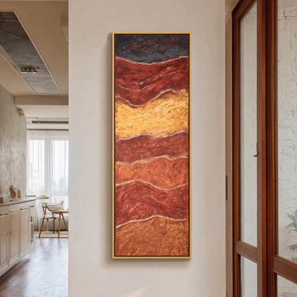 Vertical canvas wall art in interior setting.