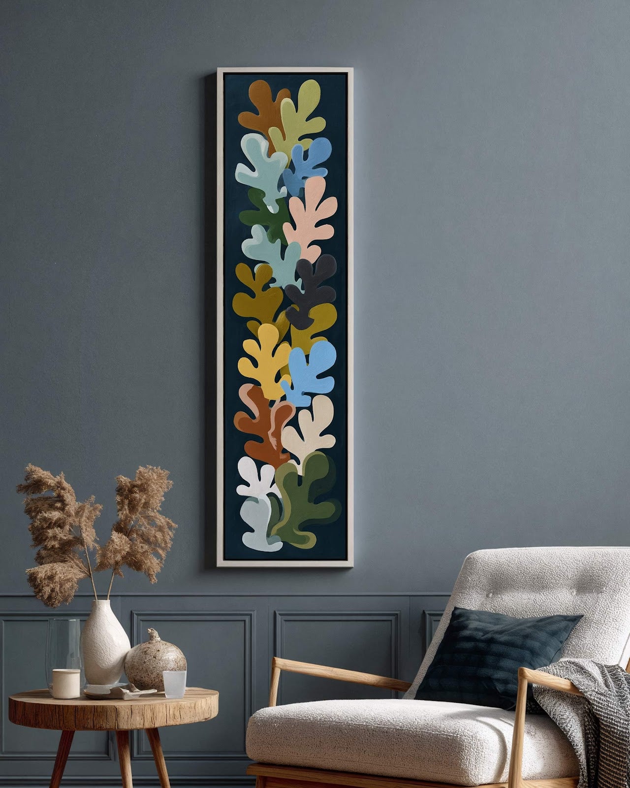 Vertical canvas wall art in interior setting.