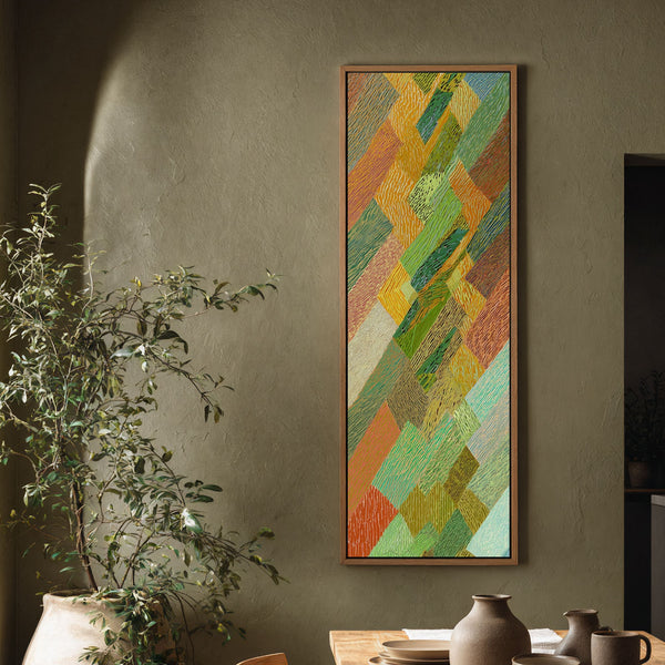 Vertical canvas wall art in interior setting.
