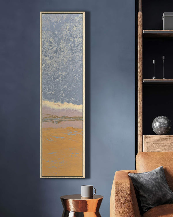 Vertical canvas wall art in interior setting.