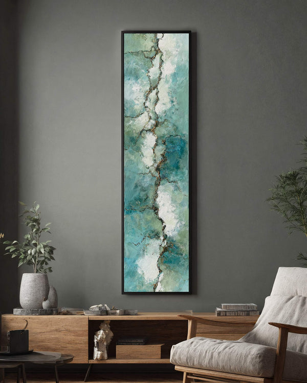 Vertical canvas wall art in interior setting.
