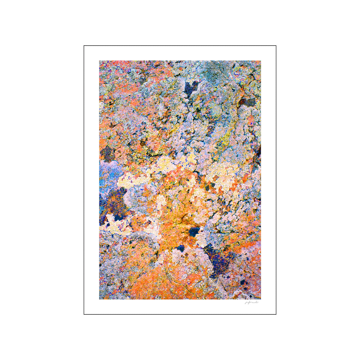 Vertical abstract photograph of a colorful rock surface with coral, blue, gold, and lilac tones