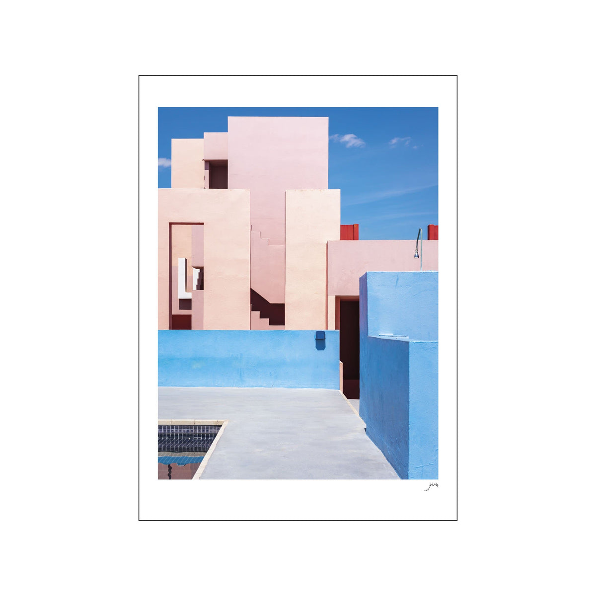 Pastel pink modernist building with blue walls, rooftop lines, and a small pool corner