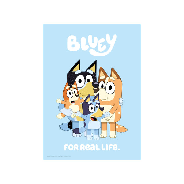 The Heeler family from Bluey huddle together on a soft blue background, smiling and embracing. The text "FOR real LIFE." appears below them in white.