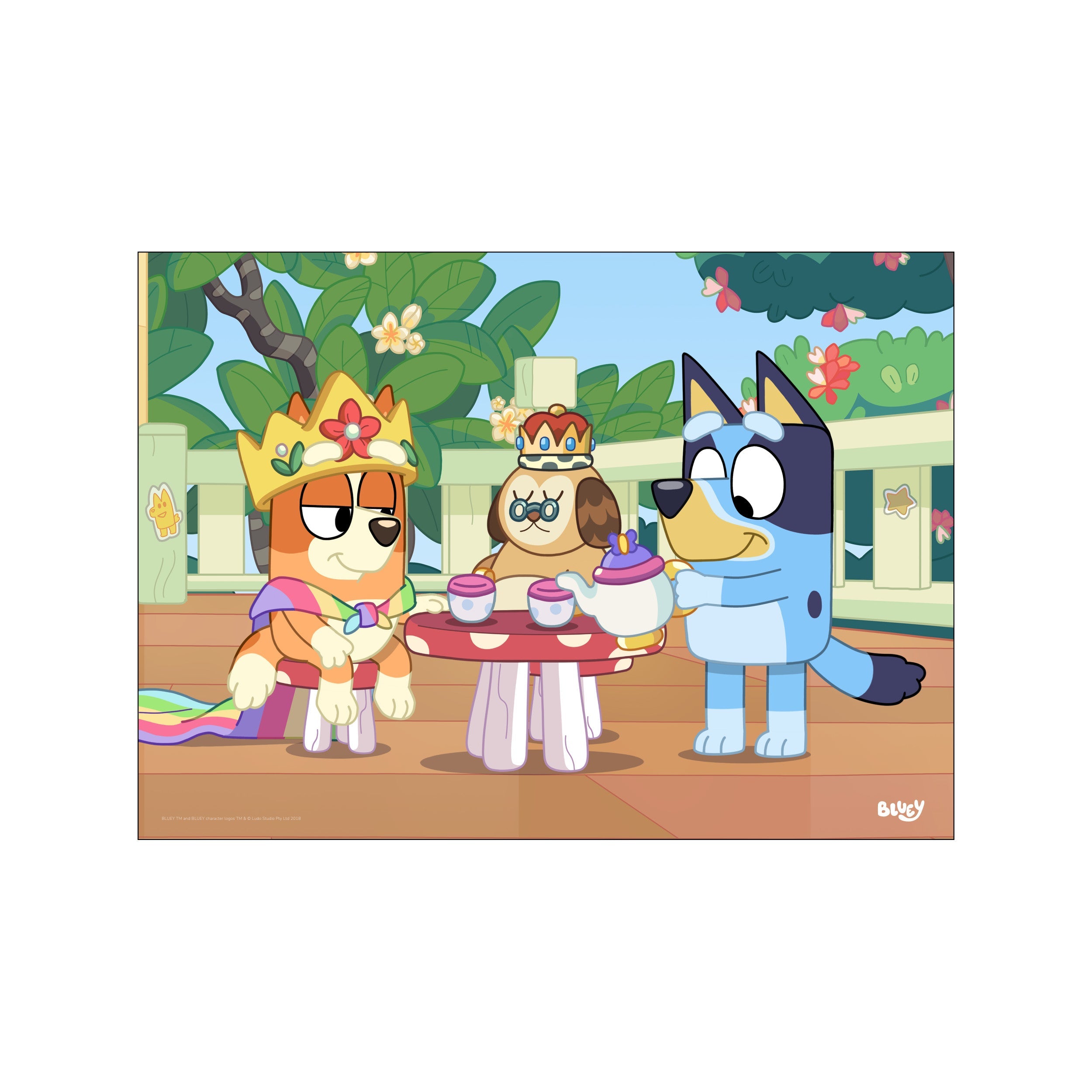 A charming illustration of Bluey characters having a tea party outdoors. One character wears a crown and rainbow cape, while another pours tea. The scene features lush greenery and a bright blue sky, evoking a.