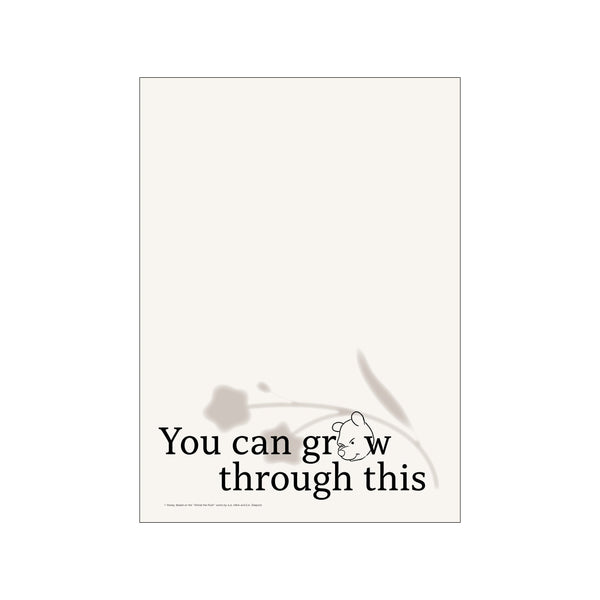 An art piece with the text "You can grow through this" in bold serif font, accompanied by a subtle line drawing of Winnie the Pooh and soft, abstract floral shapes in muted taupe and cream.