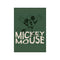 Mickey Mouse in a dynamic, jumping pose against a deep green background, with his name in distressed cream lettering. Evokes a whimsical, nostalgic, and serene mood.